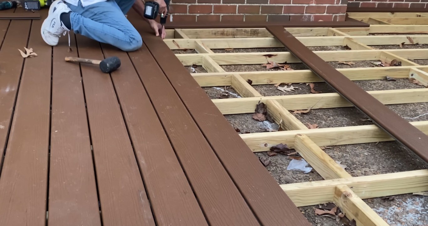 Deck replacement project showing old and new construction side by side